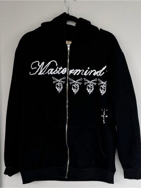hypebeast black zip-up hoodie with white script logo